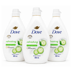 Three white bottles of Dove Refreshing Body Wash with cucumber graphics, arranged side by side on a white background.