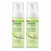 Two bottles of Simple Kind to Skin Vital Vitamin Foaming Cleanser side by side on a white background.