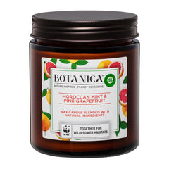 Bolanica candle jar with label on a white background