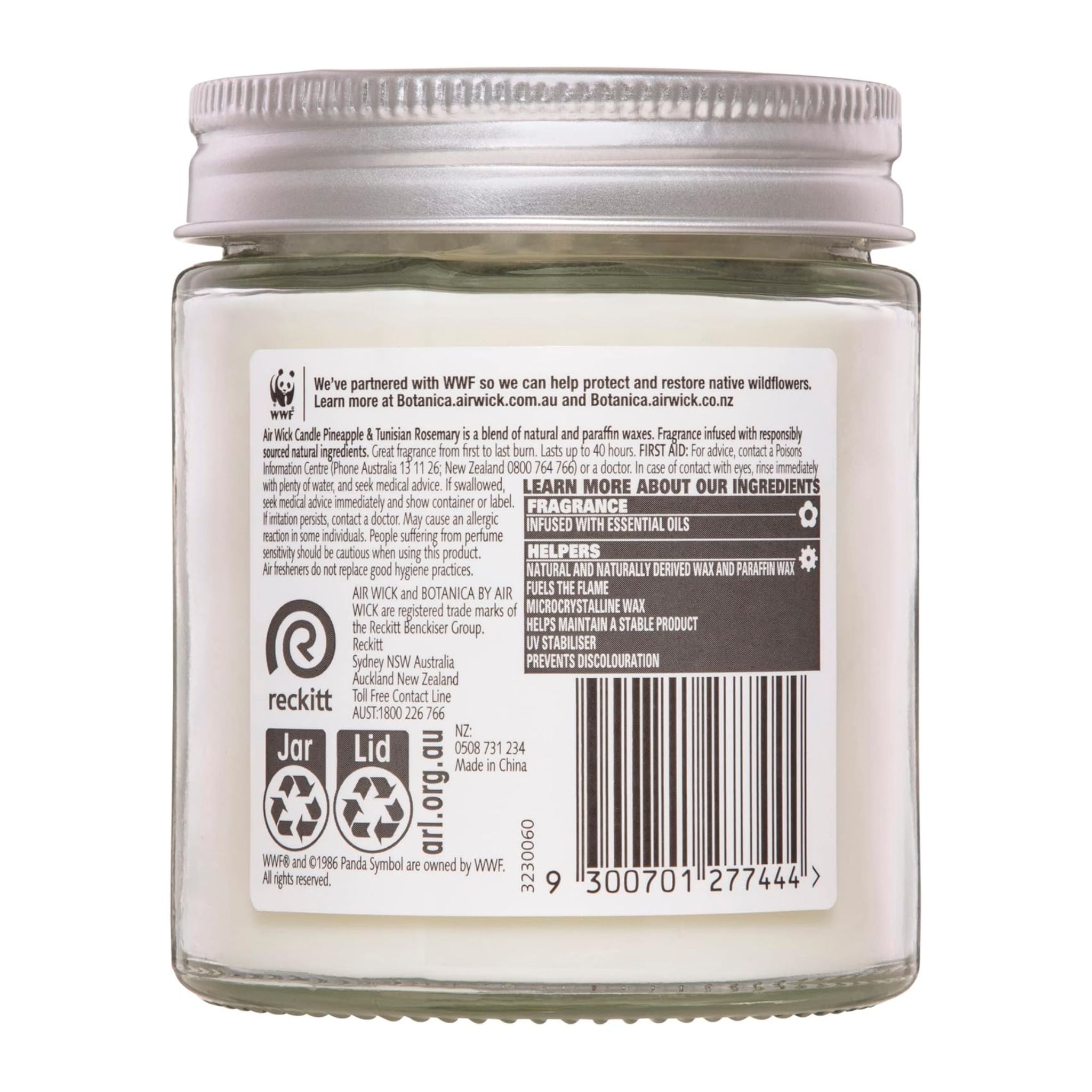 Back of a glass jar with a label featuring text and logos on a white background