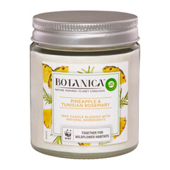 Candle jar with Botanica label featuring pineapple and Tunisian rosemary on a white background