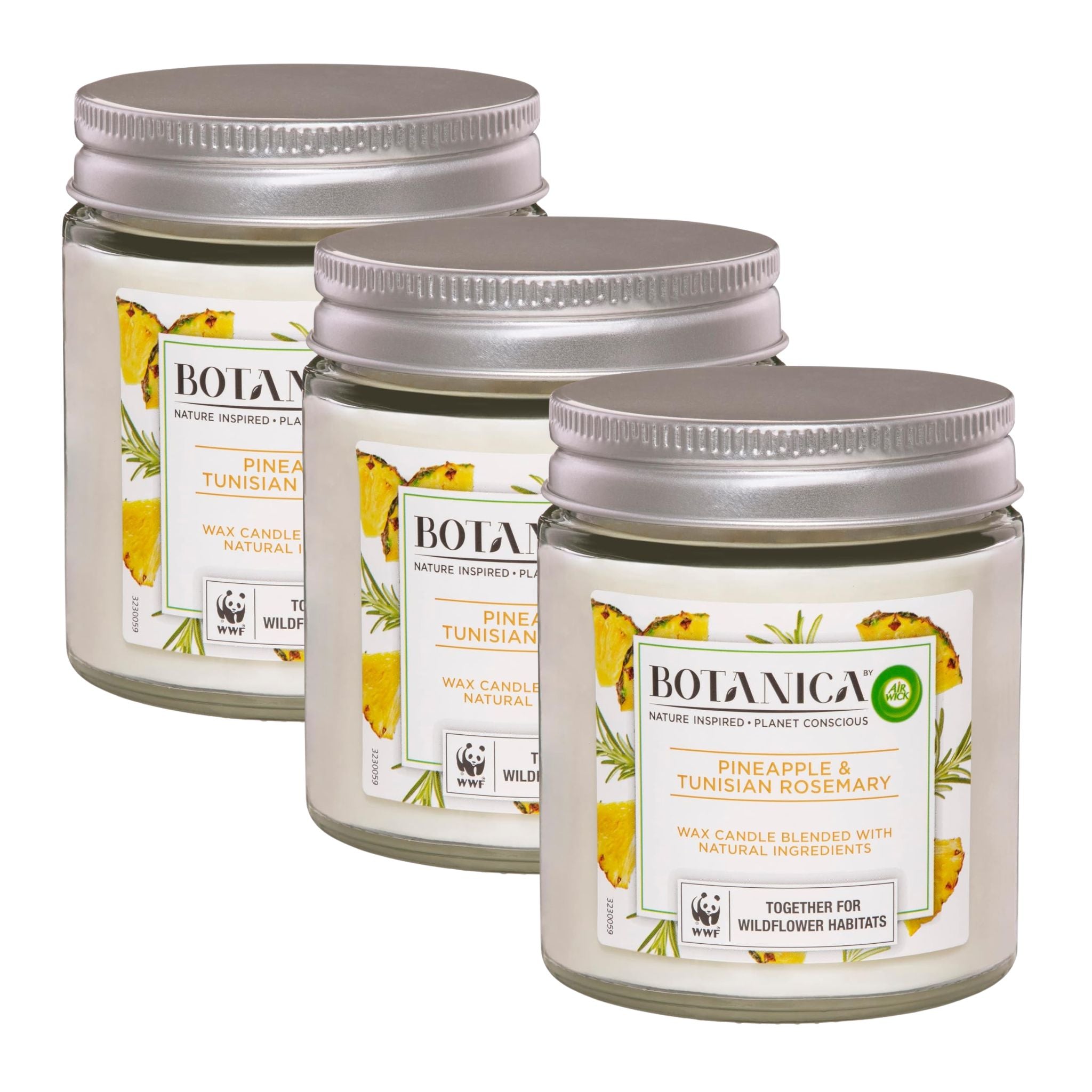 Three Botanica candles with pineapple and Tunisian rosemary flavor on a white background