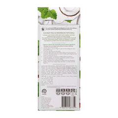 Back of a product packaging with text and images of coconut and leaves on a white background