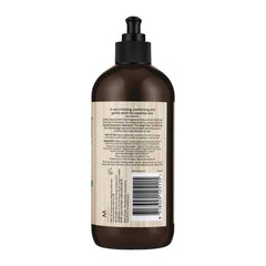 Brown bottle with pump and label on a white background