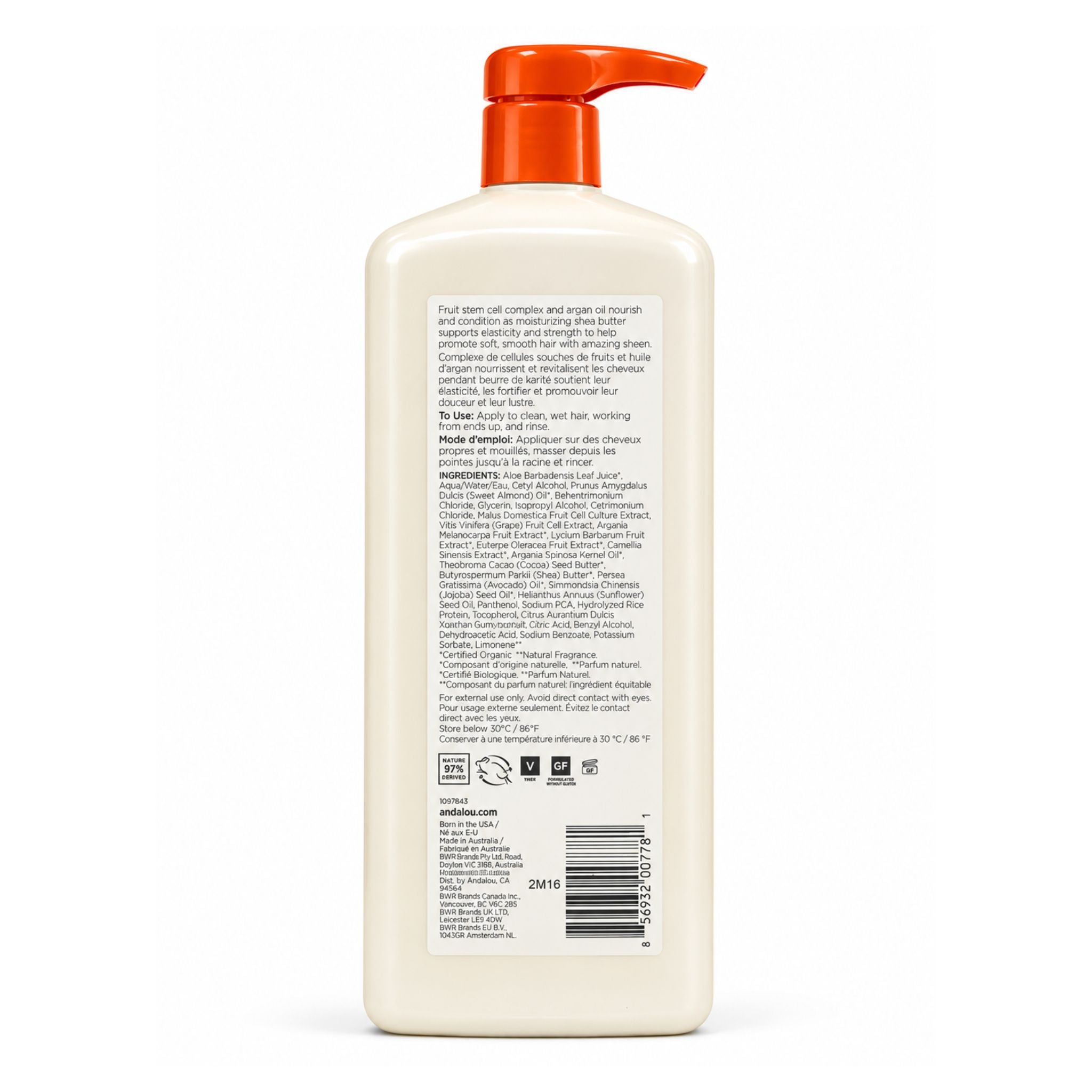 A bottle of hair conditioner viewed from the back, featuring a cream-colored plastic body and a bright orange pump dispenser, with detailed product ingredients printed on the back label.
