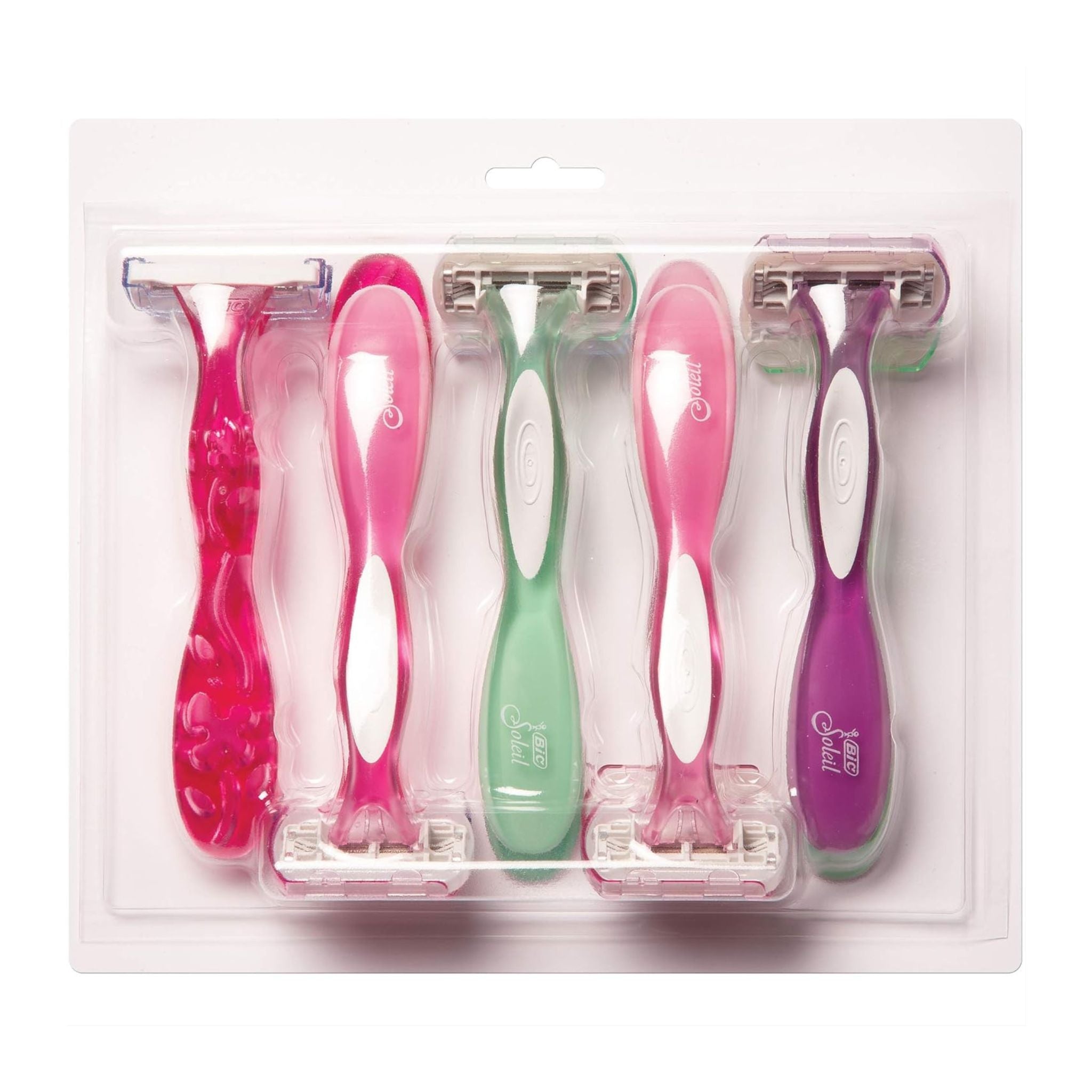 Set of colorful razors in packaging on a white background