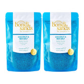 Two packages of bondi sands Coconut & Sea Salt body scrub on a white background
