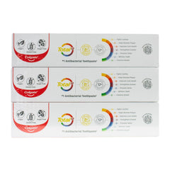 Three boxes of Colgate Total 12 antibacterial toothpaste on a white background