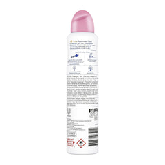 Deodorant spray bottle with pink cap on a white background