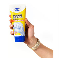 DU'IT Tough Hands 150g tube held in hand, showing size and design.