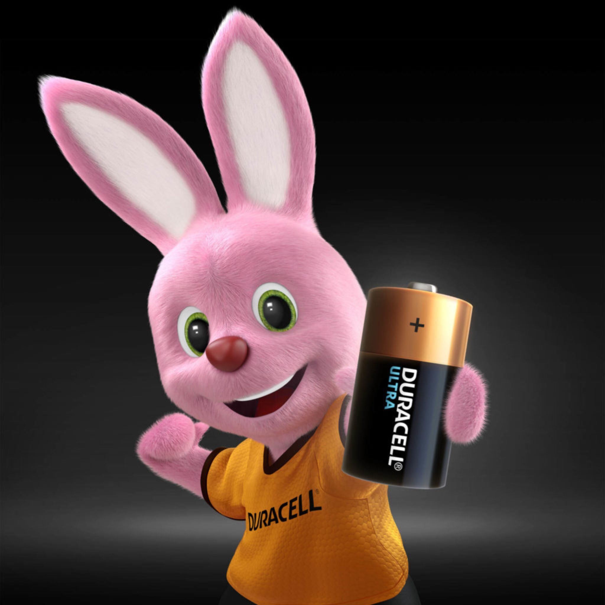 Pink cartoon bunny character holding a Duracell battery against a black background