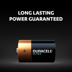 Duracell battery with 'Long Lasting Power Guaranteed' text on a black background