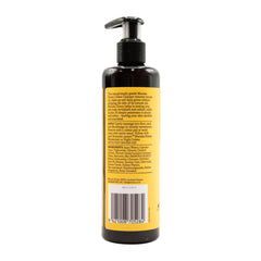 Bottle with pump and yellow label on a white background