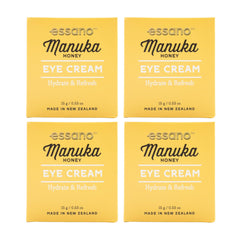 Four boxes of essano Manuka Honey Eye Cream on a white background