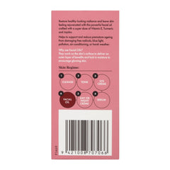 Pink skincare product label with text and a barcode on a white background