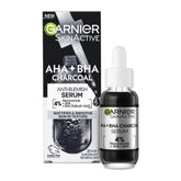 Garnier SkinActive AHA+BHA Charcoal serum bottle and packaging on a white background