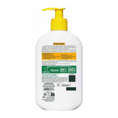 Garnier hair care product bottle with pump on a white background