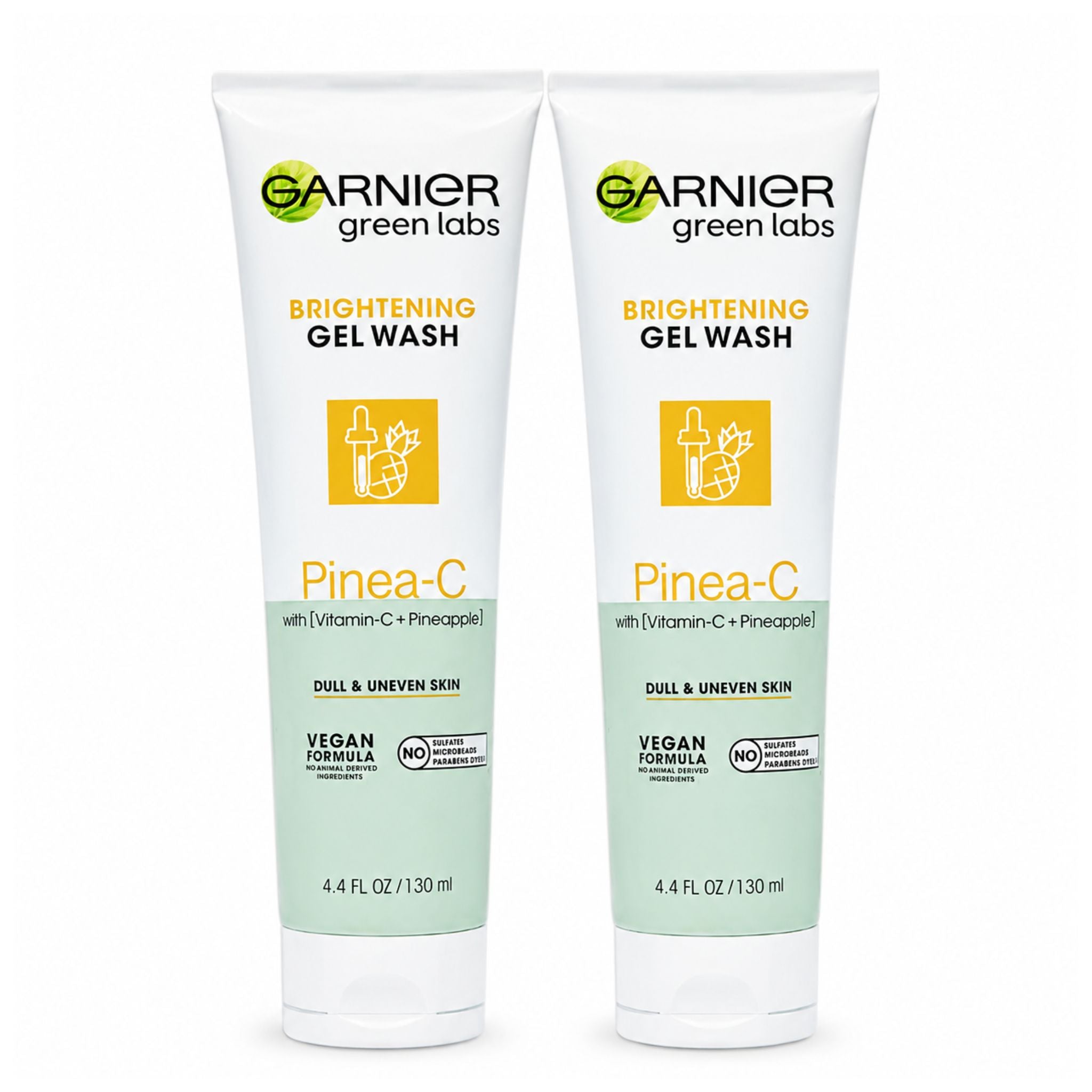 Two bottles of Garnier Green Labs Brightening Gel Wash with Pinea-C on a white background