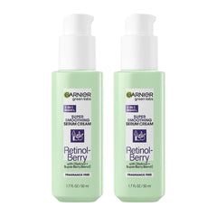 Two bottles of Garnier Green Labs Super Smoothing Serum Cream on a white background