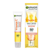 Garnier Vitamin C Daily Tinted Even Tone Fluid packaging on a white background