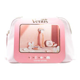 Gillette Venus ComfortGlide White Tea Razor Gift Set packaging, featuring a pink and white color scheme with an image of the razor handle and blade refills, accompanied by a razor cap and pouch, all displayed in a clear window.
