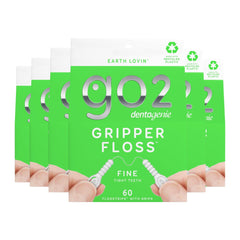 Packaging of 902 Dentagenie Gripper Floss with green background and visible text.