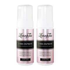 Two bottles of Loving Tan 2 HR Express Deluxe Bronzing Mousse on a white background