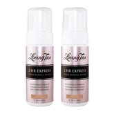 Two bottles of Loving Tan 2 HR Express Deluxe Bronzing Mousse on a white background