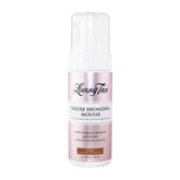 Loving Tan Deluxe Bronzing Mousse bottle on a white background