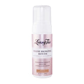 Loving Tan Deluxe Bronzing Mousse bottle on a white background