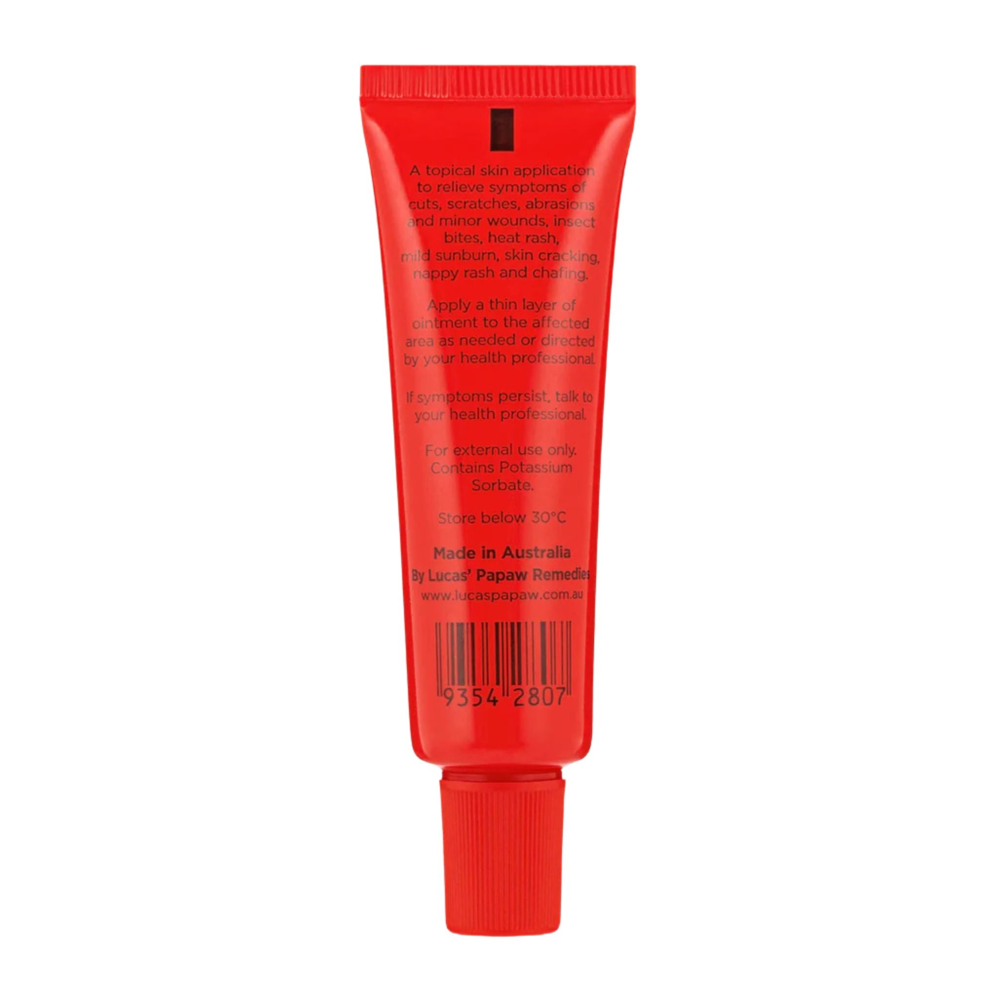 Red tube of skincare product on a white background