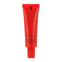 Red tube of skincare product on a white background