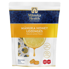 Packaging of Manuka Health MGO 400+ Manuka Honey Lozenges with Lemon Flavor, displaying the product name, weight of 250g, and highlighting natural lemon flavor.