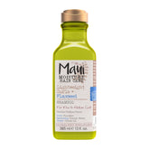 Green bottle of Maui Moisture Hair Care shampoo with gold cap on a white background