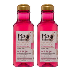 Two bottles of Maui Moisture shampoo with pink liquid and gold caps on a white background.