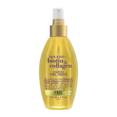 Yellow bottle of OGX thick & full + biotin & collagen weightless oil mist on a white background