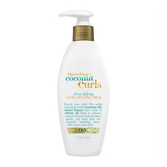 OGX Coconut Curls styling milk bottle on a white background