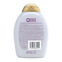 Back view of a shampoo bottle with a gold cap on a white background