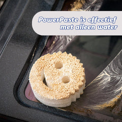 Scrub Daddy Power Paste cleaning oven glass with smiley sponge using only water