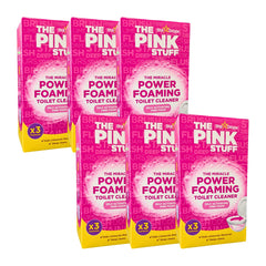 Five boxes of 'The Pink Stuff' power foaming toilet cleaner on a white background