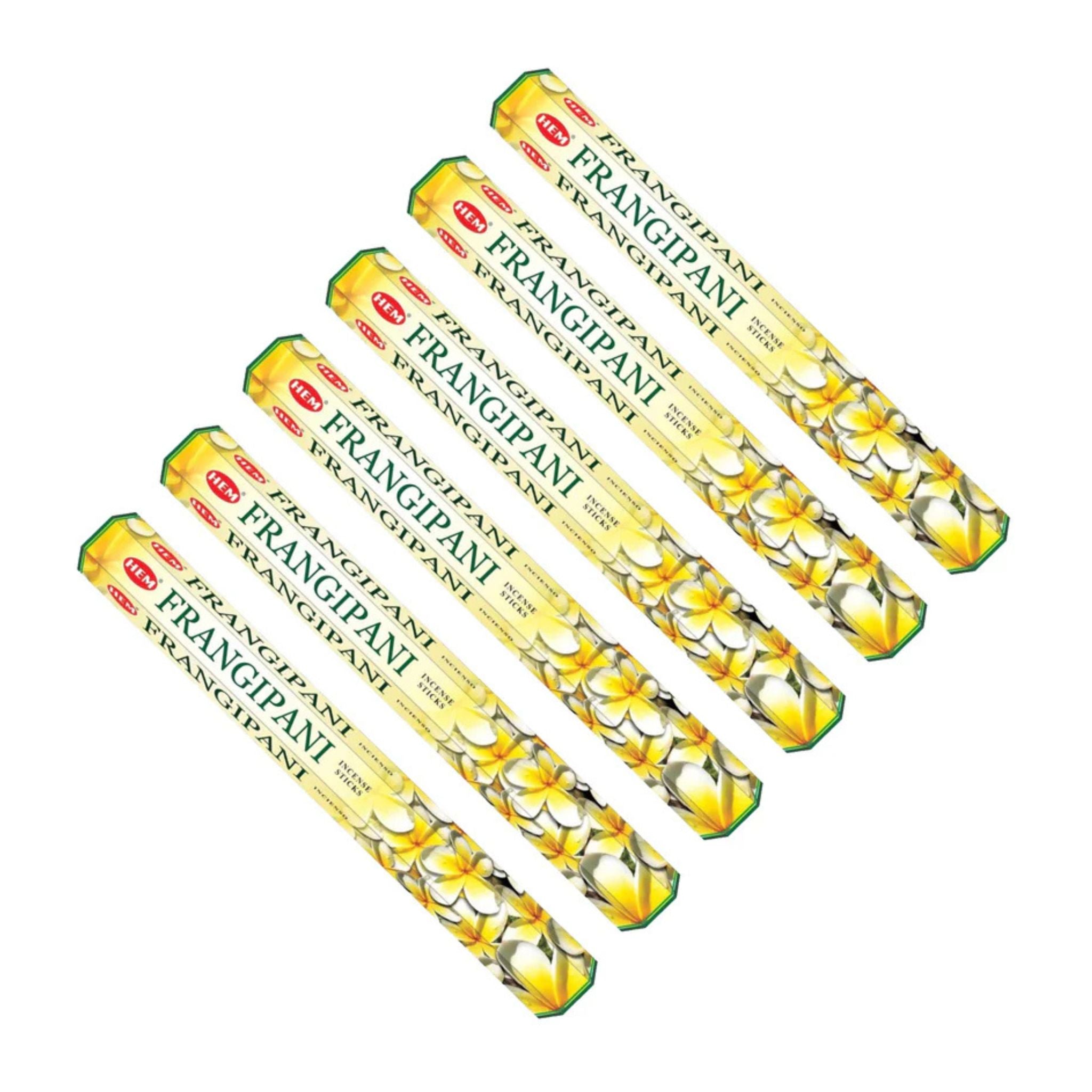 Set of Frangipani incense sticks on a white background