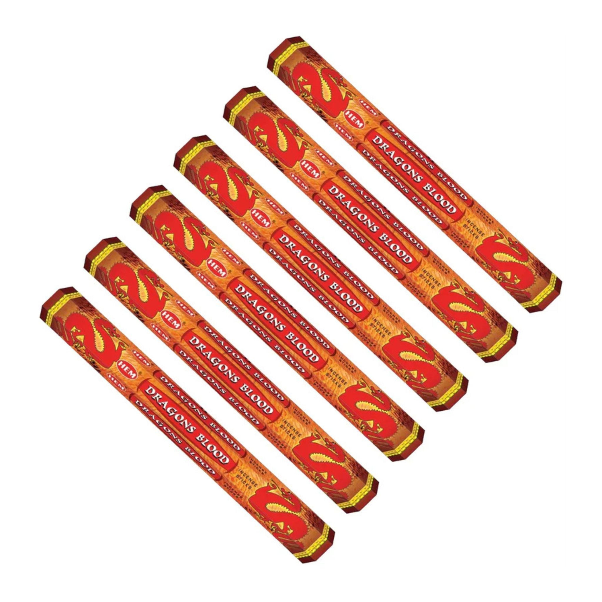 Set of incense sticks with red and yellow packaging on a white background