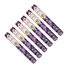 Set of six purple incense sticks with visible brand labels on a white background