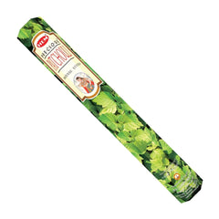 Pack of incense sticks with green leaf design on a white background