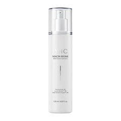 White skincare bottle with silver cap on a white background