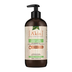 Brown bottle of A'kin Purifying Hand Wash on a white background