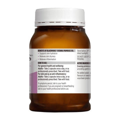 Brown supplement bottle with white label on a white background