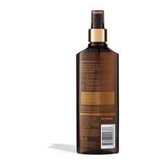 Brown bottle with gold cap on a white background