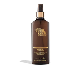 Brown bottle of Bondi Sands Everyday Liquid Gold tanning oil on a white background