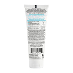 Back view of a cosmetic tube with text and a barcode on a white background
